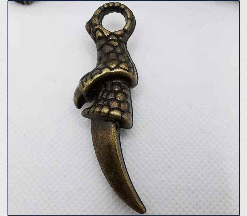 Krallen-Anhänger mit Ringöse, bronze/dunkelgold, gepanzerte Krallen-Optik