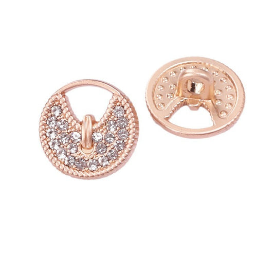 Round button with hollow metal shank, sand gold finish and clear rhinestone pattern, back view