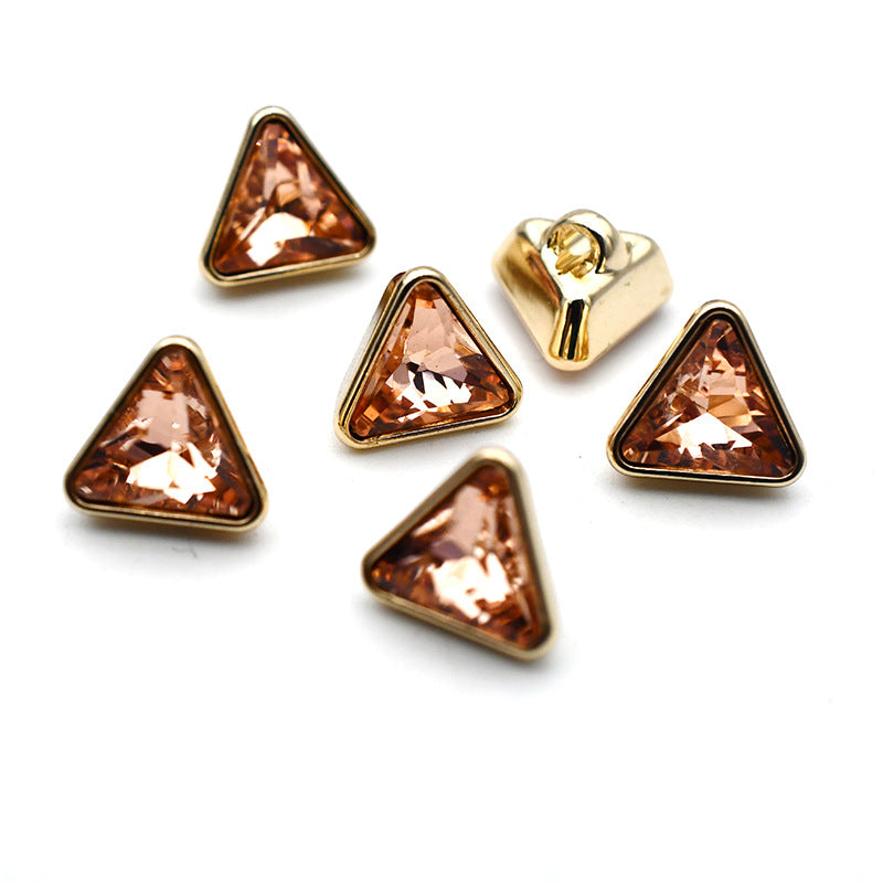 Gold metal shank cuff buttons with triangular glass stones in amber and bronze tones