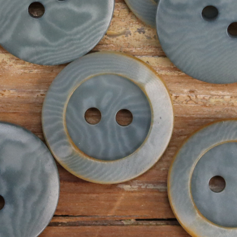 Blue-gray round 2-hole buttons with scorched rim edge and textured finish