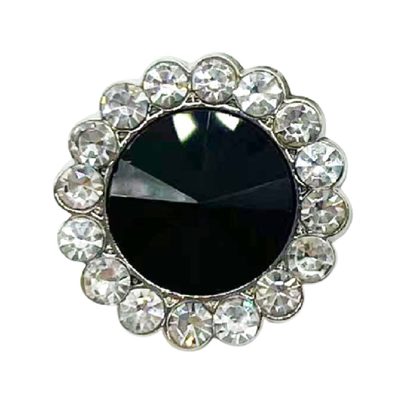 Rhinestone flower button with dark black round center and silver-toned border