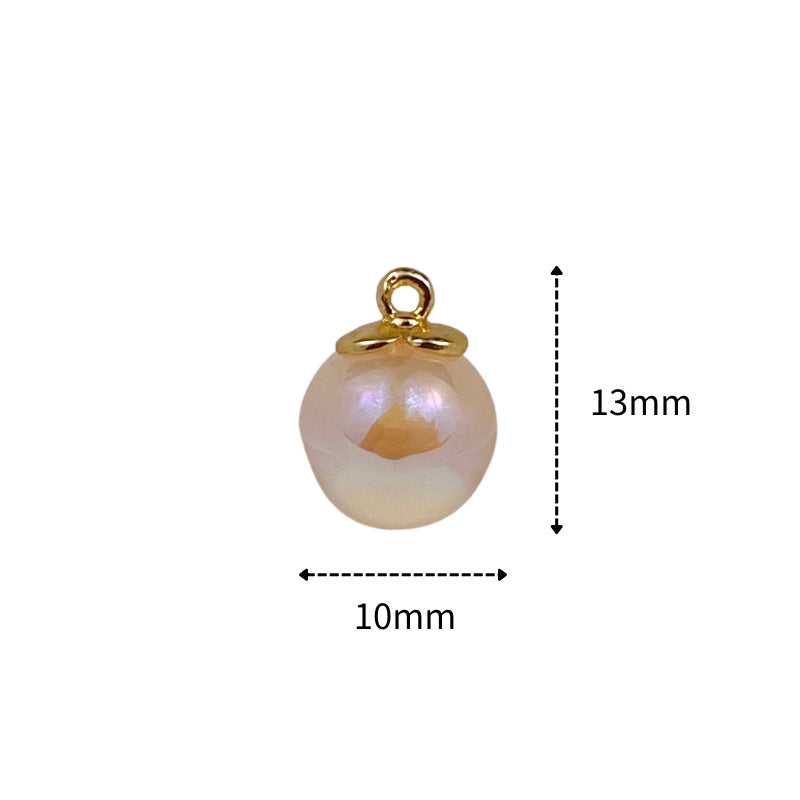 Pearl-shaped button, iridescent beige round with gold ring shank; size 10mm x 13mm
