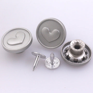 Vintage silver heart-pattern stud button set for denim jeans, with clasp pieces