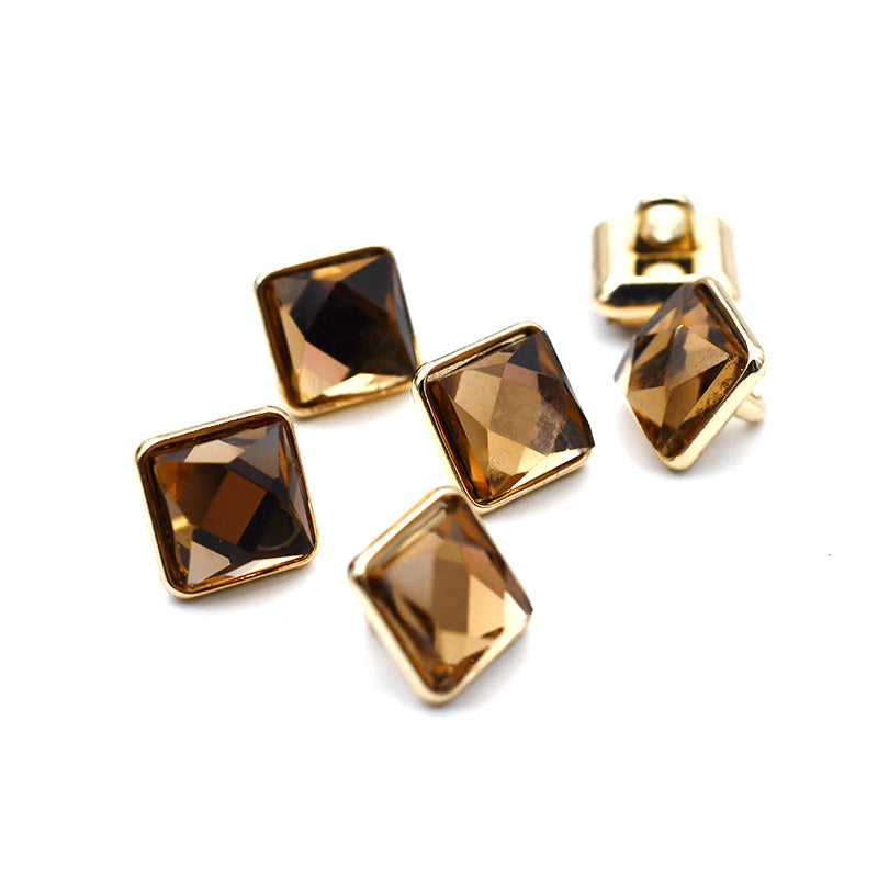 Gold metal shank cuff buttons with square glass stones in bronze and dark brown tones