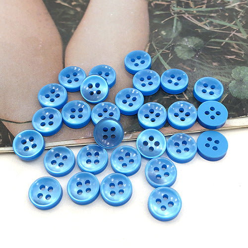 Bright blue round 4-hole shirt buttons, bold color with four-hole face