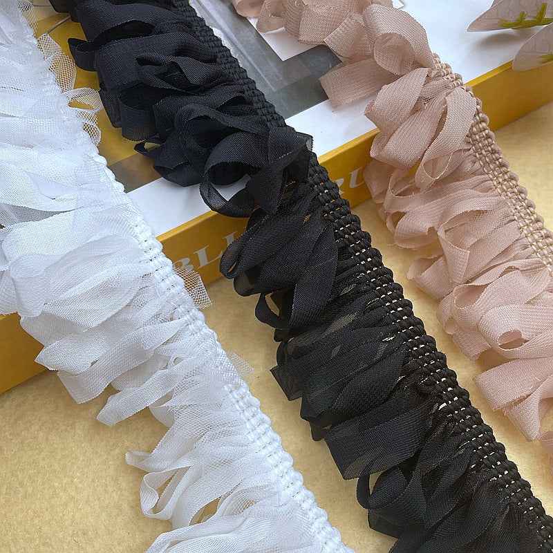 Woven chiffon fringe trim with tassels, braided edge, black, 5 cm