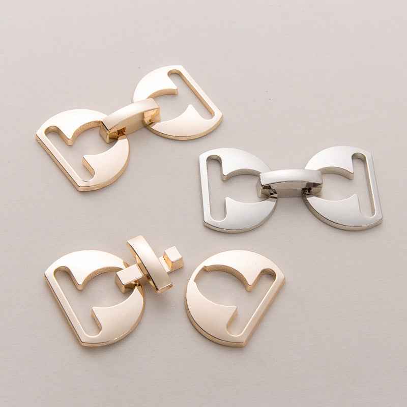 Assorted gold and silver detachable belt buckle clasps with curved clip frame