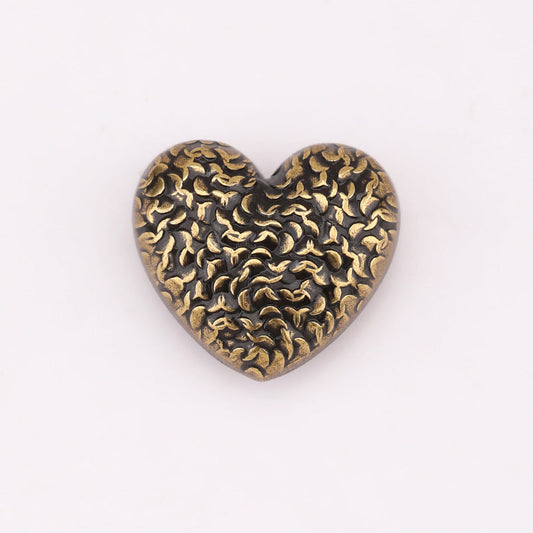 Heart-shaped textured metal shank button, antique gold with scale pattern