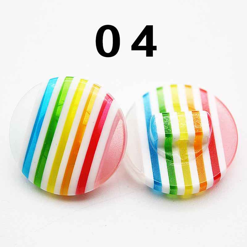 Color 04: multicolor striped resin shirt button, pale base, round shank, front and back.