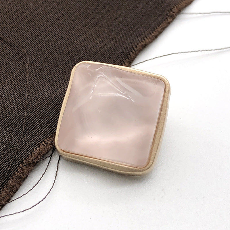 Square stone-look coat button, light blush pink, gold-tone metal shank