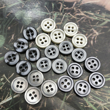 Round resin shirt buttons, 4-hole, grey and light grey mix, flat front view
