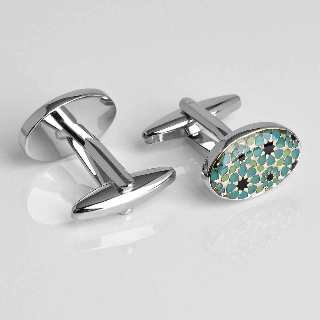 Oval blue and black mosaic cufflinks with hinged bar design, silver-tone