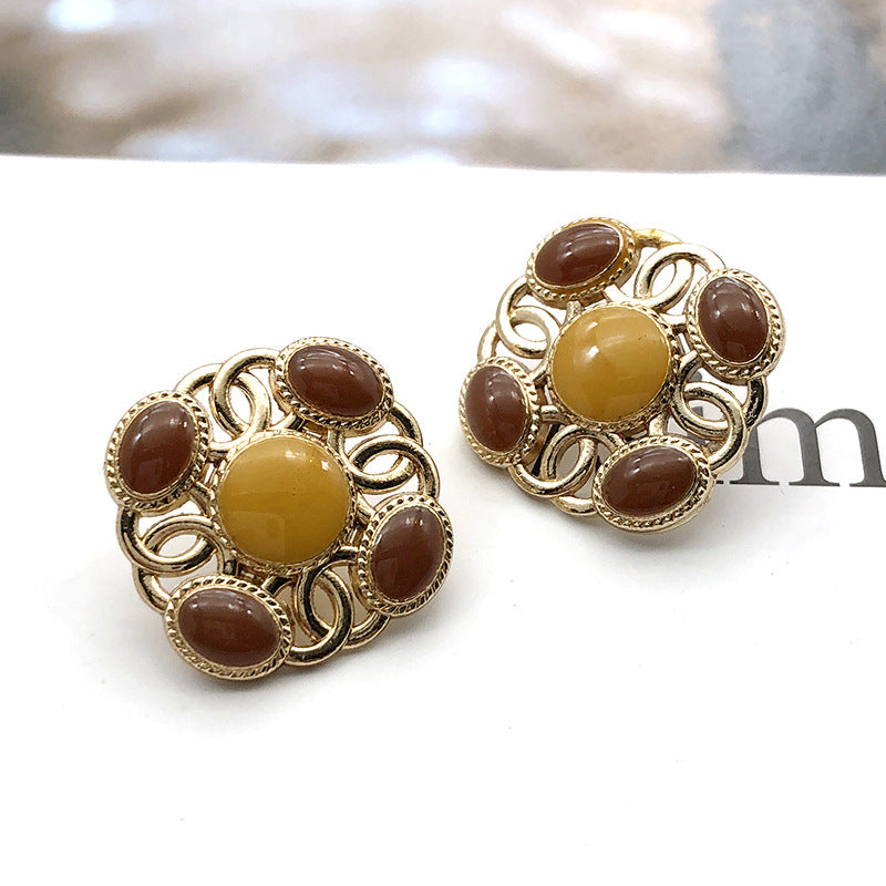 Square metal shank pearl buttons with yellow center and brown round pearl accents