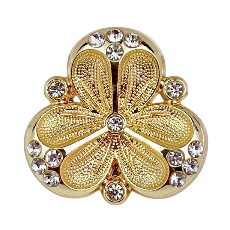 Gold diamond three-petal flower metal shank button with rhinestone center and side stones