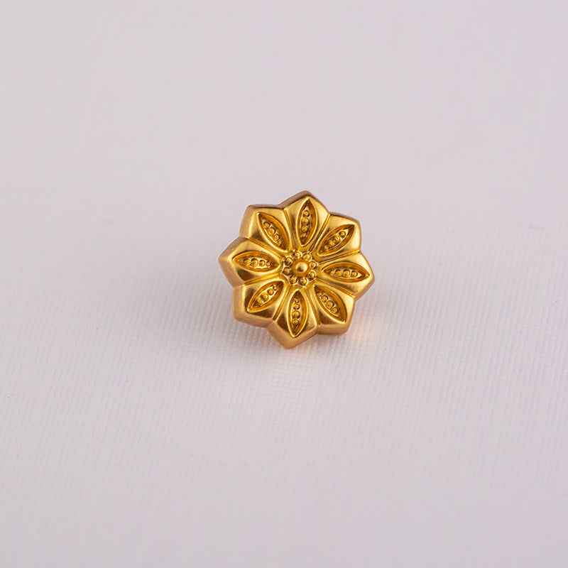 Gold Chinese-style shirt button with flower/star petal design