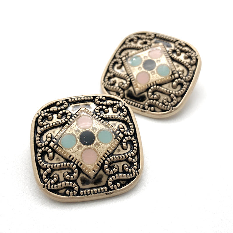 Exotic metal shank buttons with pearl/diamond inlay, ornate gold-tone frame, multicolor stones