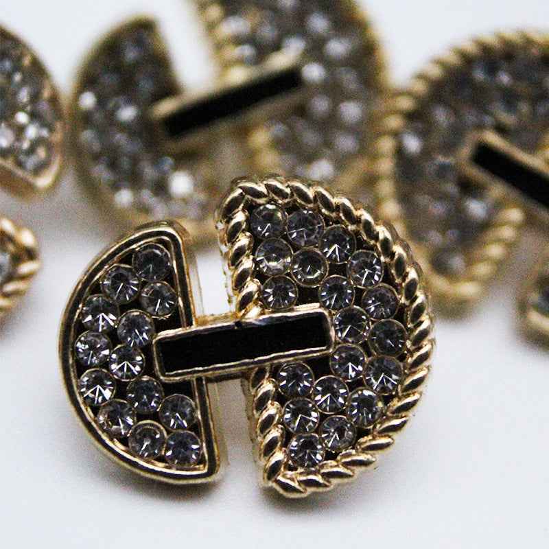 Gold umbrella-shaped rhinestone metal shank button with dark center bar