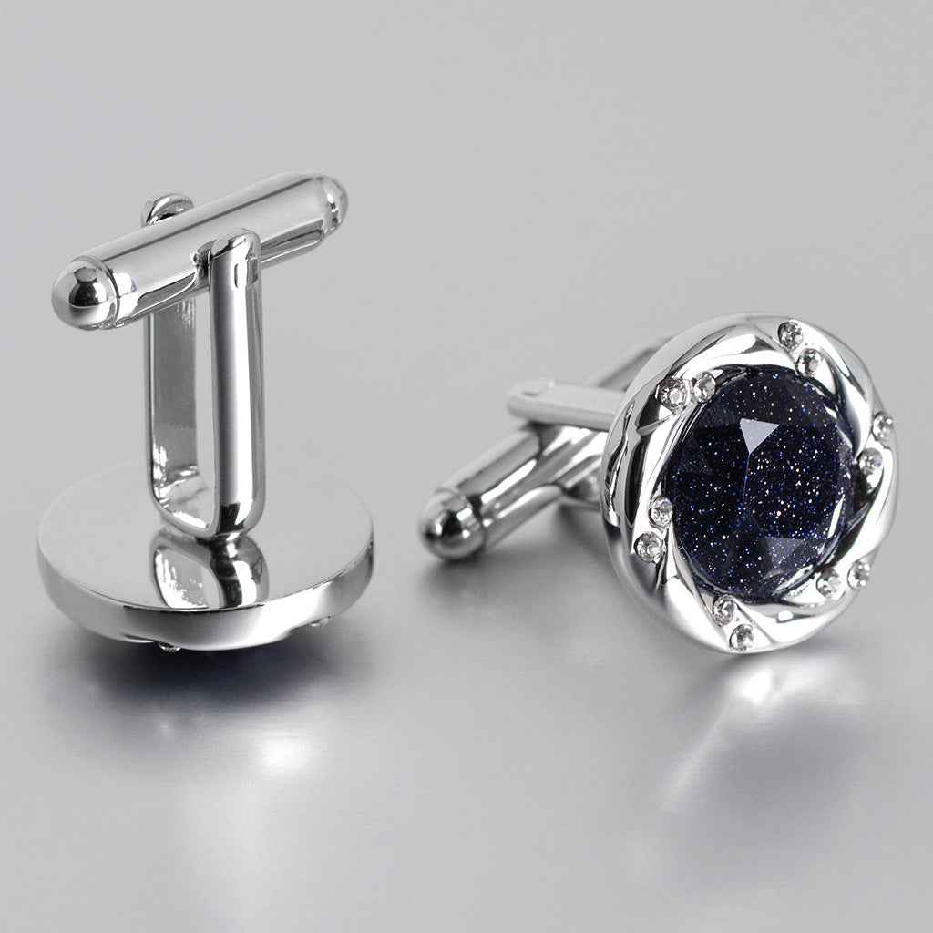 Silver-tone cufflinks with bar posts and round blue speckled gemstone settings
