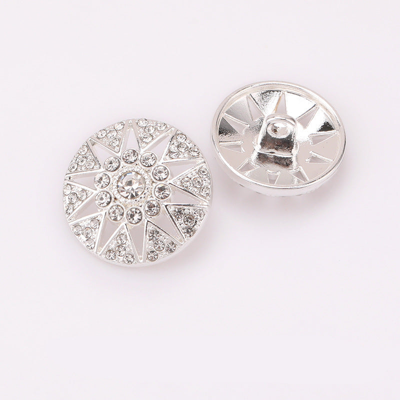 Hollow star crystal metal shank button pair, bright silver tone, front and back.
