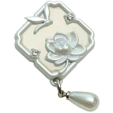 Silver 1-inch metal sew-on button with lotus and dragonfly motifs, rhinestone accents