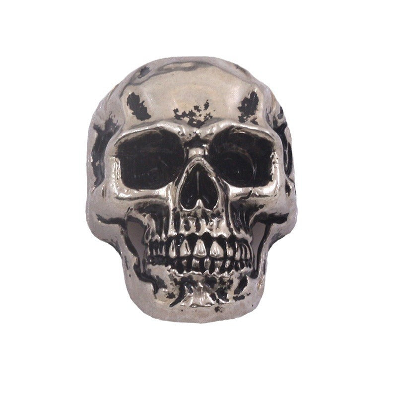 Calavera de metal con acabado vintage, botón tipo remache con dos orificios