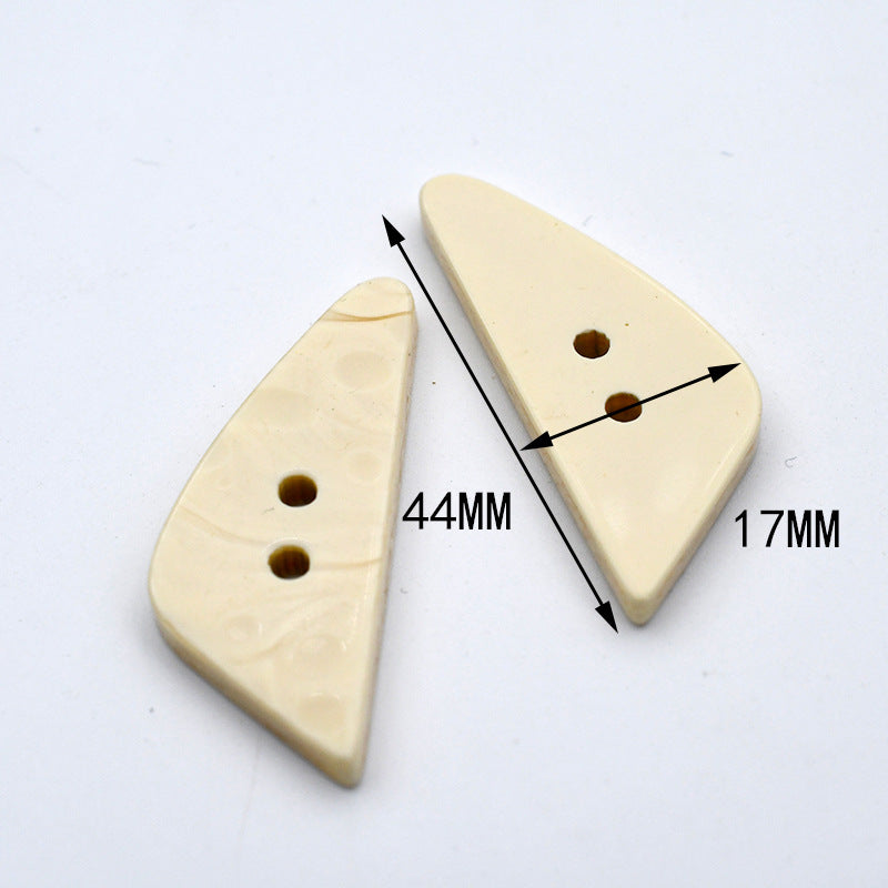 Triangular beige resin buttons, 2-hole fronts; measurements 44mm and 17mm shown