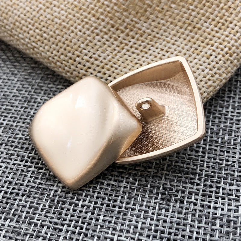 24mm curved square coat button, gold-tone metal shank, off-white face, set of 20