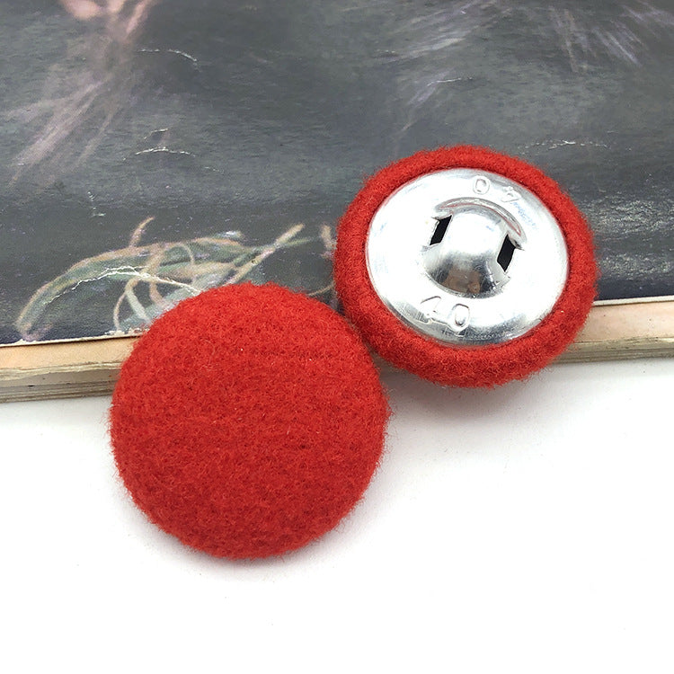 Two 28mm fabric-covered buttons: red textile face with silver metal snap