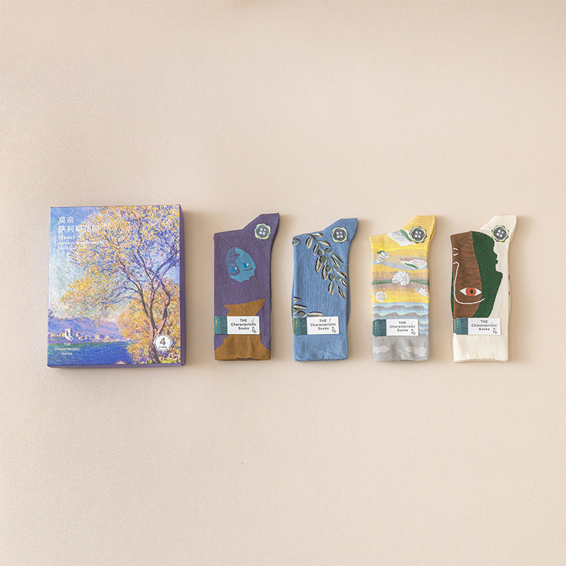 Monet-style cotton socks 4-pack: purple, blue leaf motif, yellow stripe, and brown face print