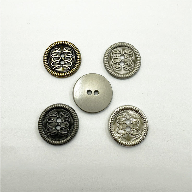 Two-hole metal buttons set: dark, silver, and blank metal discs for coats or jackets
