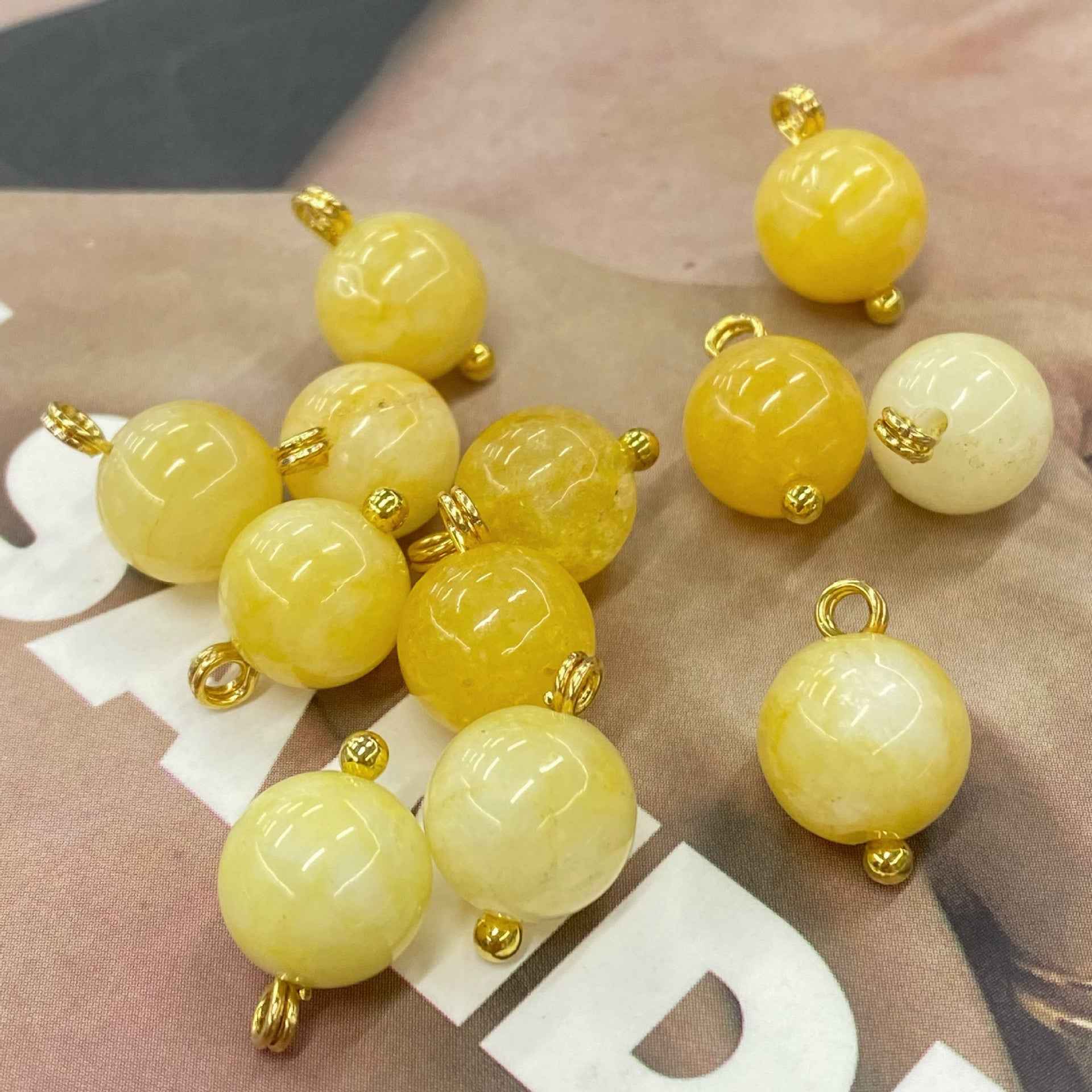 Natural jade buttons, yellow tones, gold loops, 10mm round Chinese style