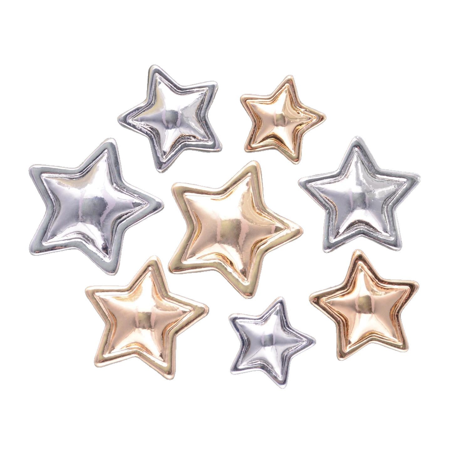 Assorted star-shaped metal shank buttons, gold and silver, neatly grouped