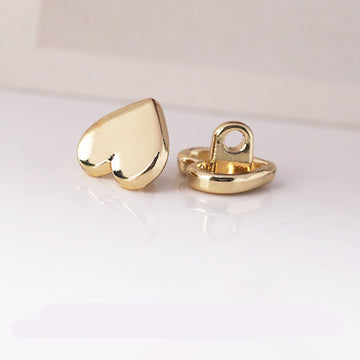 Light gold heart-shaped metal shank buttons, front and back view, 10.5mm