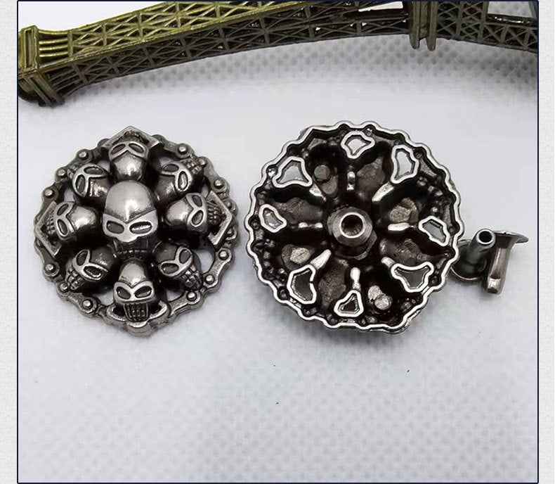 Two punk gothic skull rivet studs, silver-tone; includes one metal backing pin