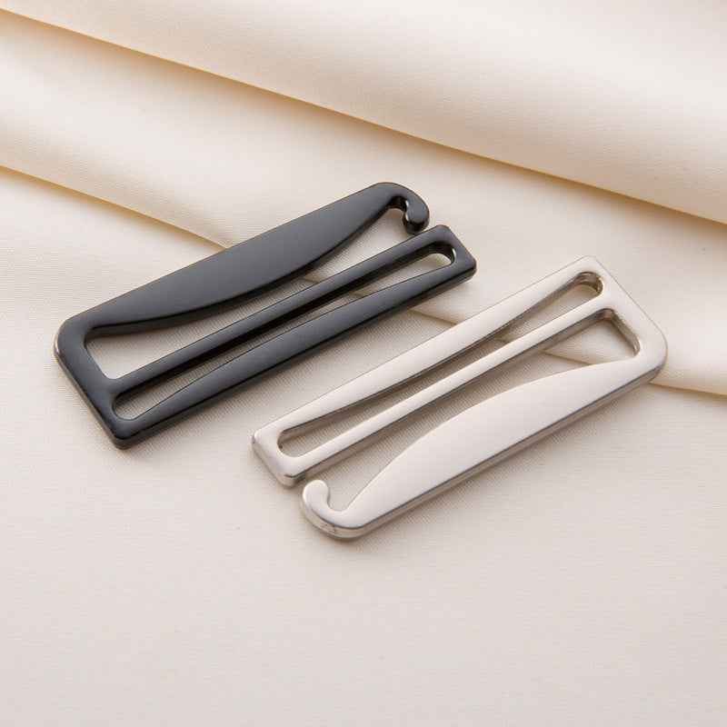 Bra strap adjusters, black and silver-toned pair with curved top and sliding bar