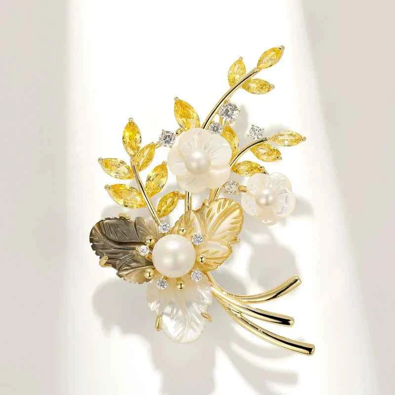 Seashell & pearl flower brooch with copper leaf stems and white pearl centers