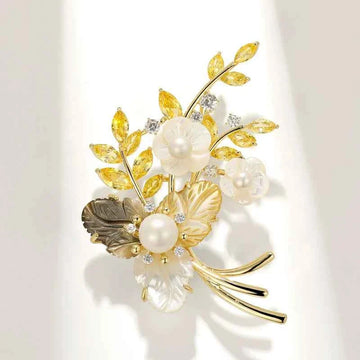 Seashell & pearl flower brooch with copper leaf stems and white pearl centers