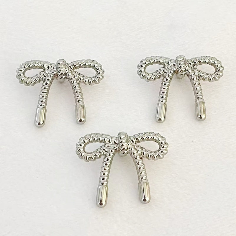 Lace Butterfly hollow metal buttons, silver tone bow design, thin edge detail
