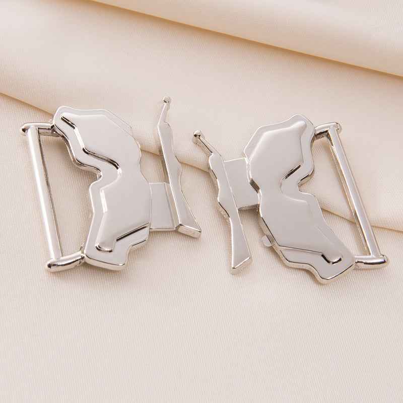 Silver butterfly coat belt clasp pair with open frame and hook prongs, 30mm