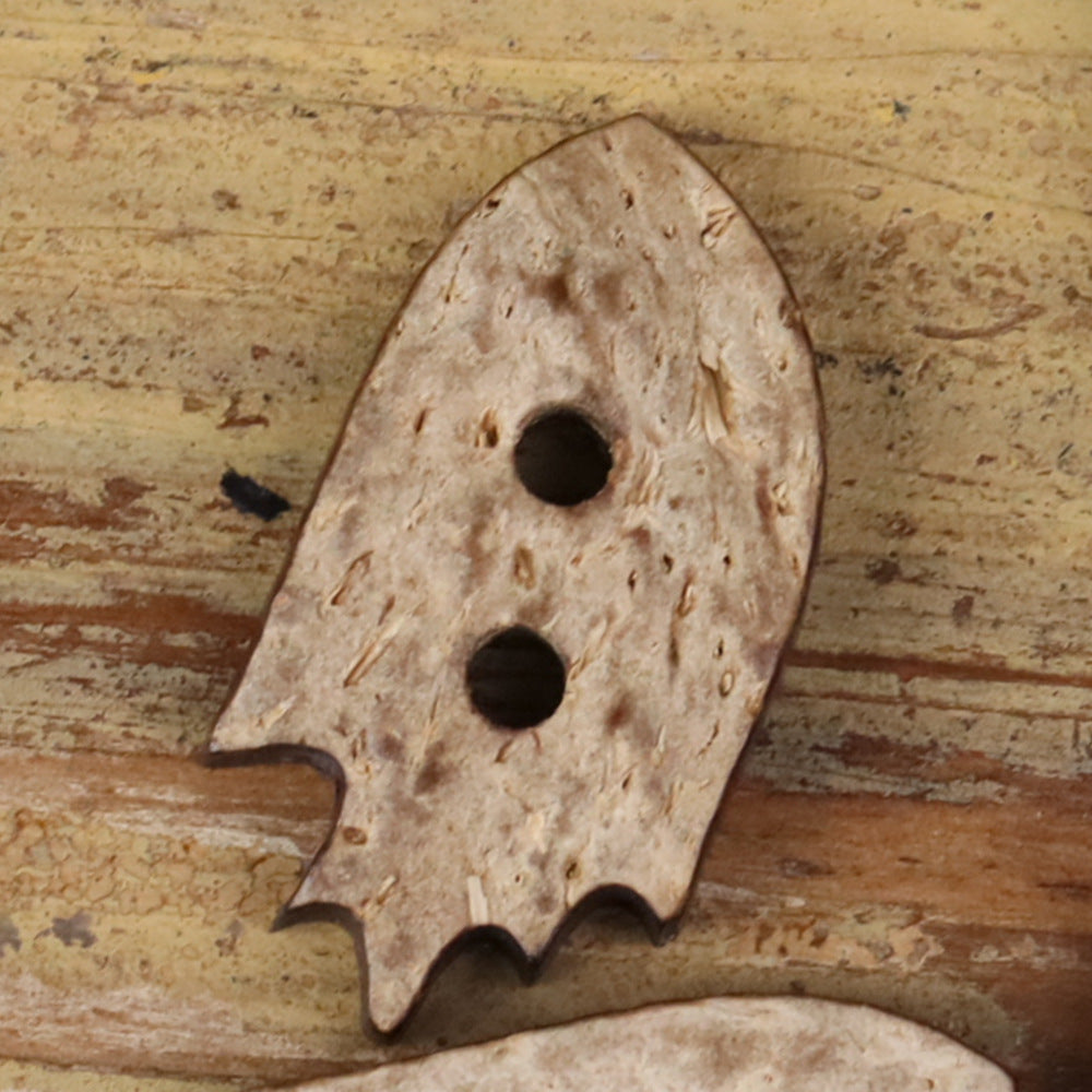 Coconut shell novelty button shaped like a ghost with two holes