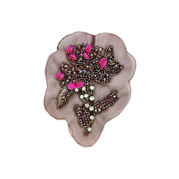 Purple lace-trimmed embroidered hand-beaded applique with ornate beaded motif