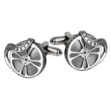Vintage film projector cufflinks in antique silver, round reels with textured fan blades