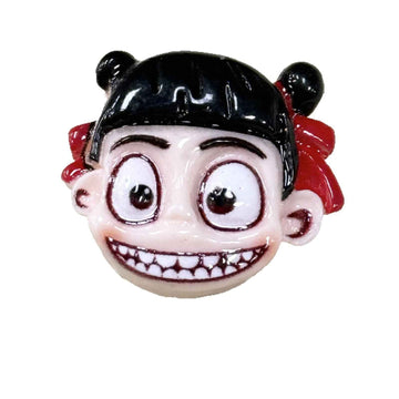 Cartoon Nezha emoji face button, black hair and red bows, metal shank