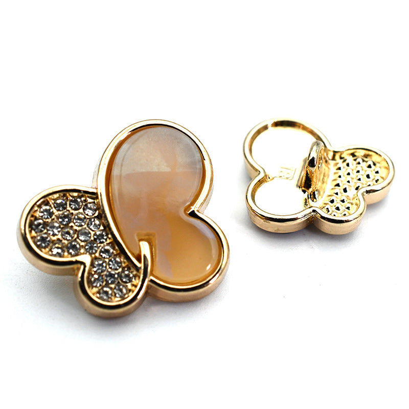 Khaki butterfly rhinestone shank button with gold-tone metal shank