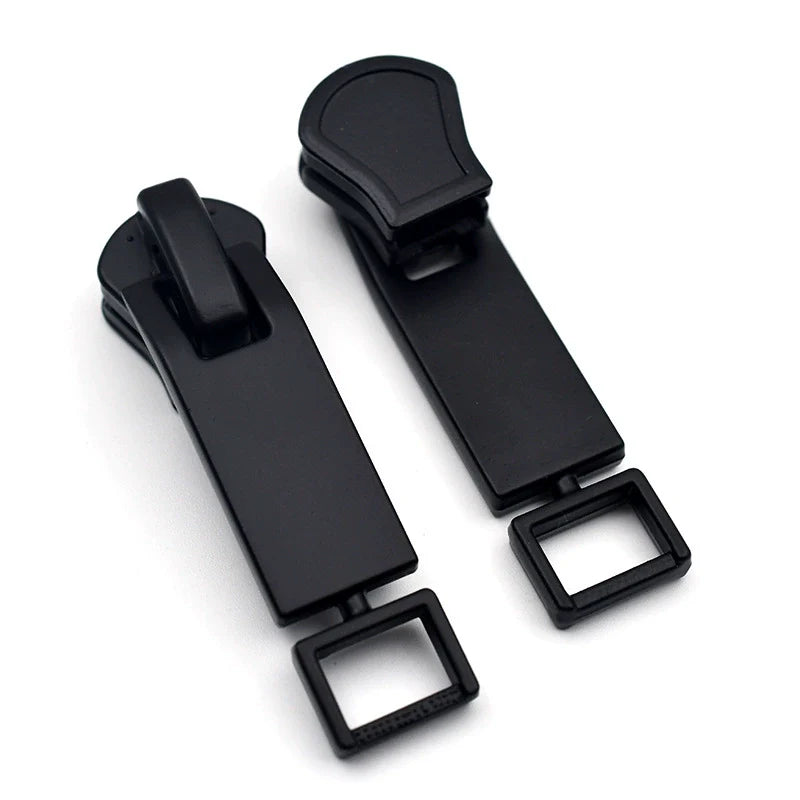 Black metal two-way zipper pull tabs with square mounting loop, 10pcs shown