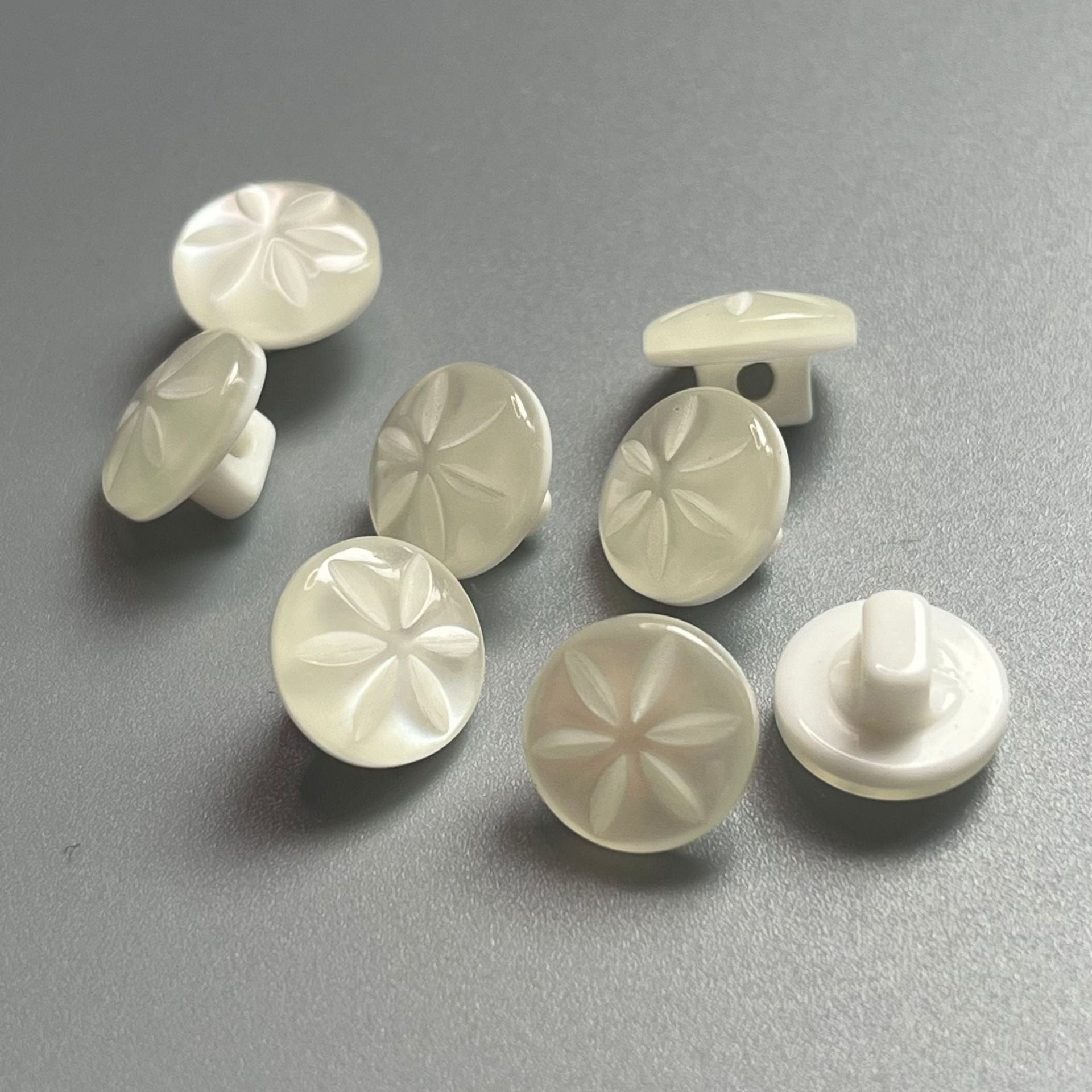 Set of resin shank buttons, light cream, flower design fronts and shanks