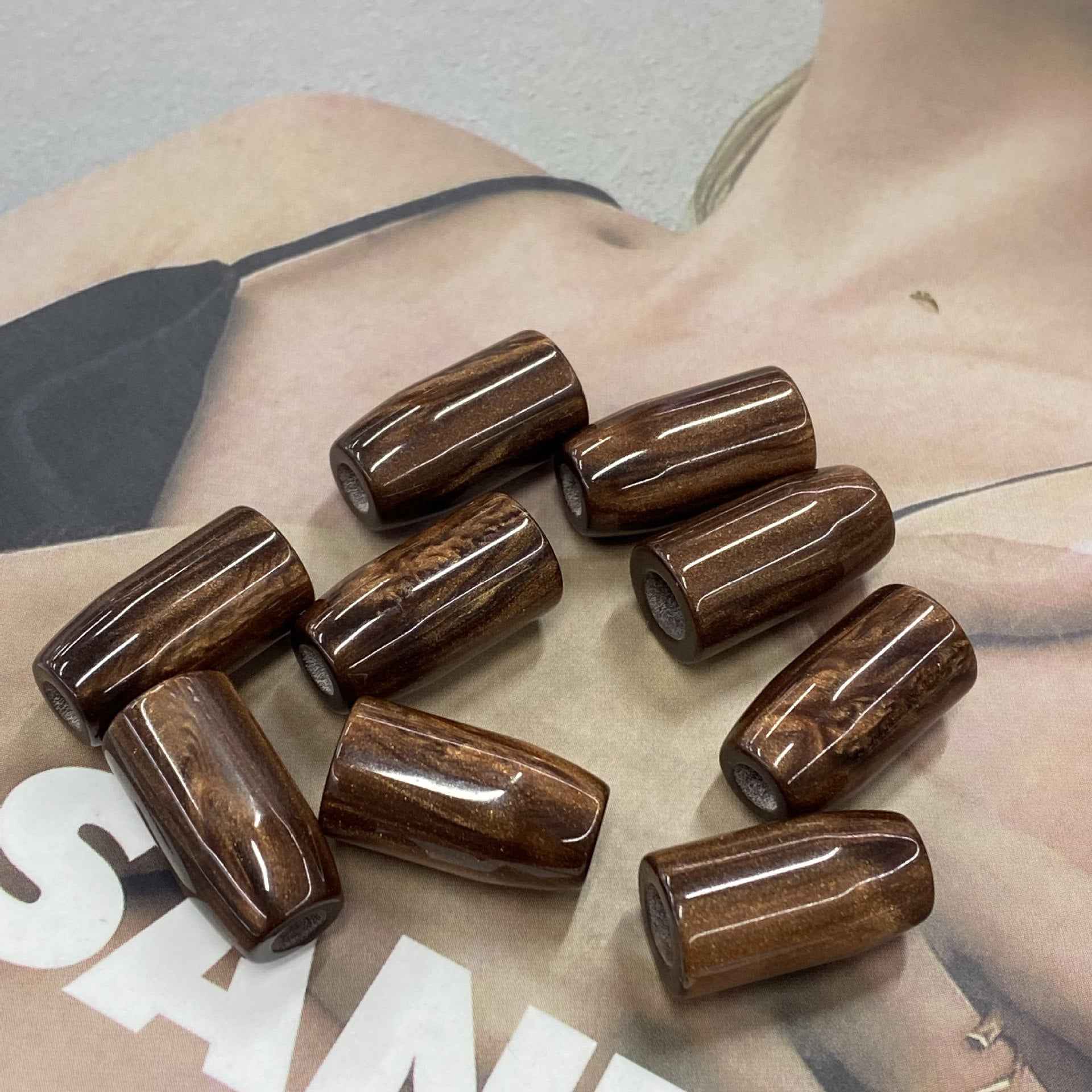 Resin bell cord buttons, single-hole, brown striped glossy pieces