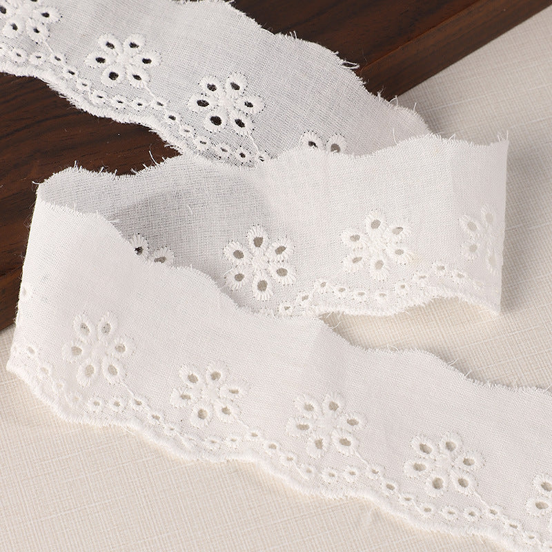 45/70mm cotton lace trim with embroidered eyelets, white