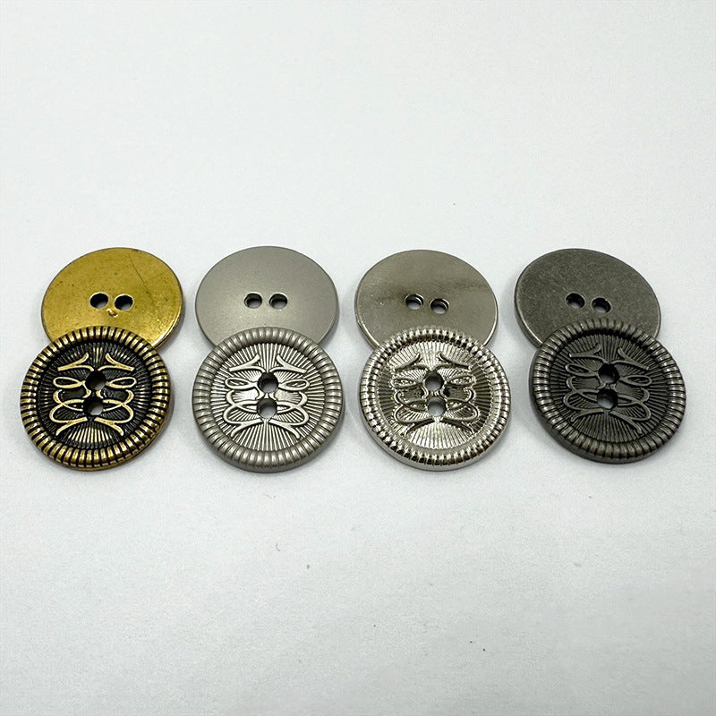Two-hole metal buttons with ornate floral filigree, gold, silver, and dark metal mix