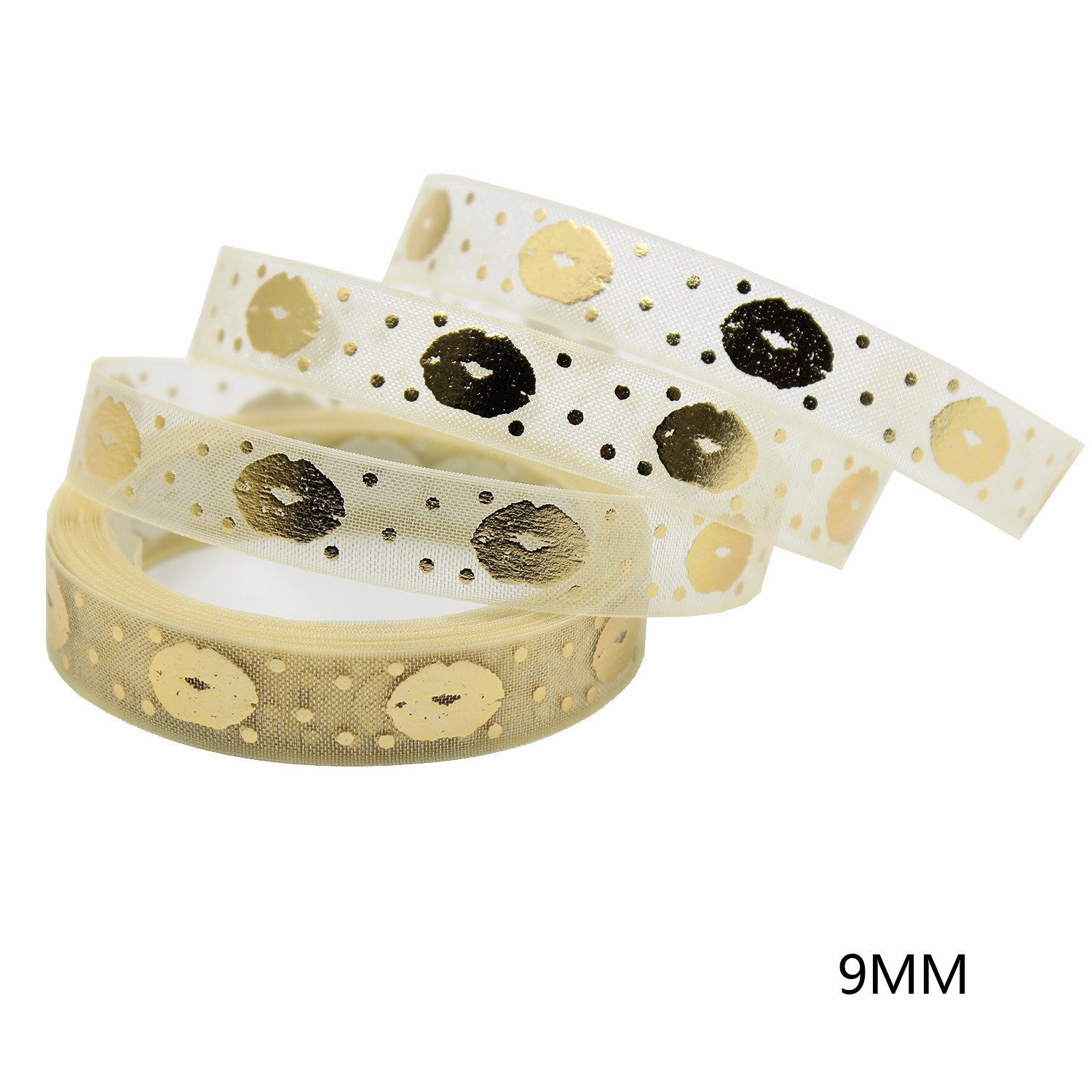 Gold foil dot-and-heart printed ribbon rolls on sheer white gauze, 9mm width